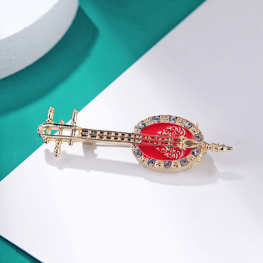 Antique Lute Red Enamel Brooch - مراجعة Suit Supply Wedding Party وسعره